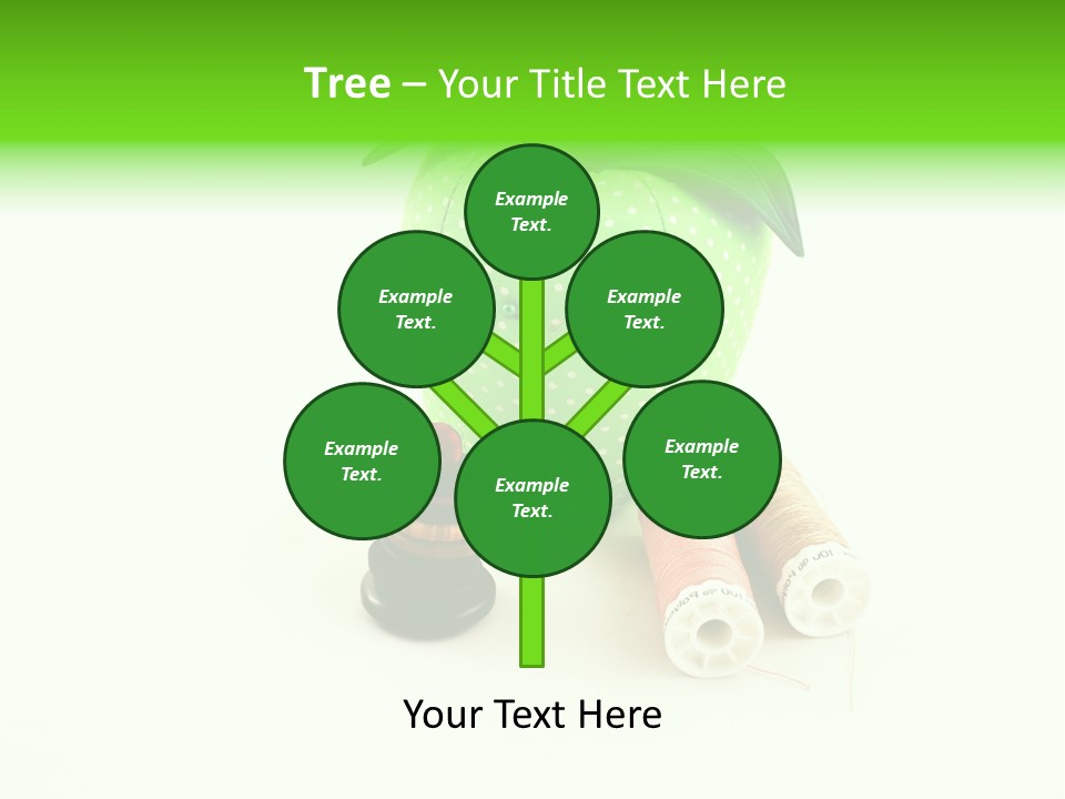 A Green Apple Sitting Next To Two Spools Of Thread PowerPoint Template
