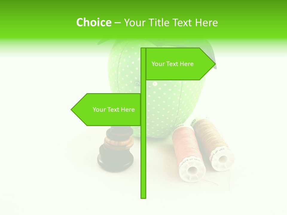 A Green Apple Sitting Next To Two Spools Of Thread PowerPoint Template