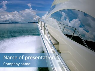 A Boat Traveling On The Water With Clouds In The Sky PowerPoint Template