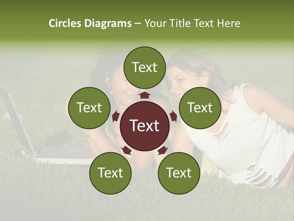 Two Women Laying In The Grass With A Laptop PowerPoint Template