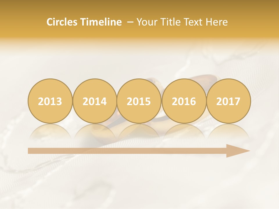 Two Gold Wedding Rings On A White Background PowerPoint Template