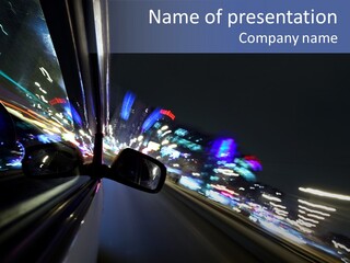 A View Of A City At Night From A Moving Vehicle PowerPoint Template