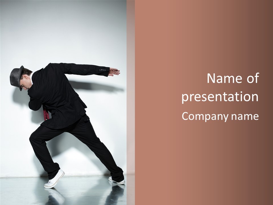A Man In A Black Suit Is Dancing PowerPoint Template