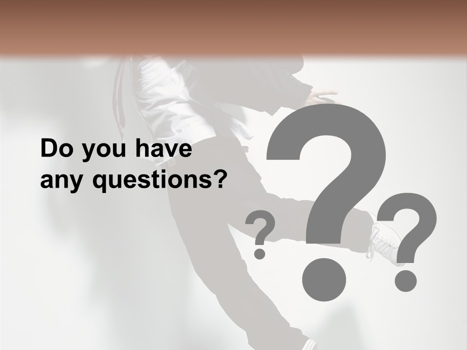 A Man In A Suit Jumping In The Air PowerPoint Template