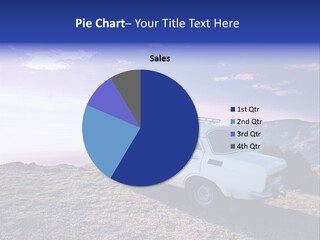 A White Car Parked On Top Of A Mountain PowerPoint Template