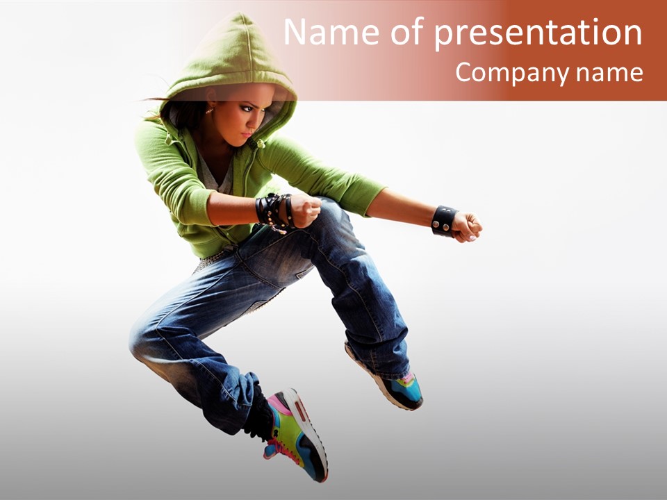 A Person Jumping In The Air On A Skateboard PowerPoint Template