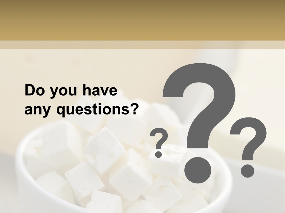 A Bowl Of Marshmallows On A Wooden Table PowerPoint Template