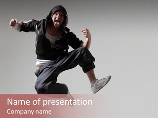 A Man Jumping In The Air With A Hoodie On PowerPoint Template