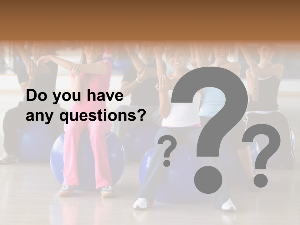 A Group Of People Sitting On Exercise Balls In A Gym PowerPoint Template