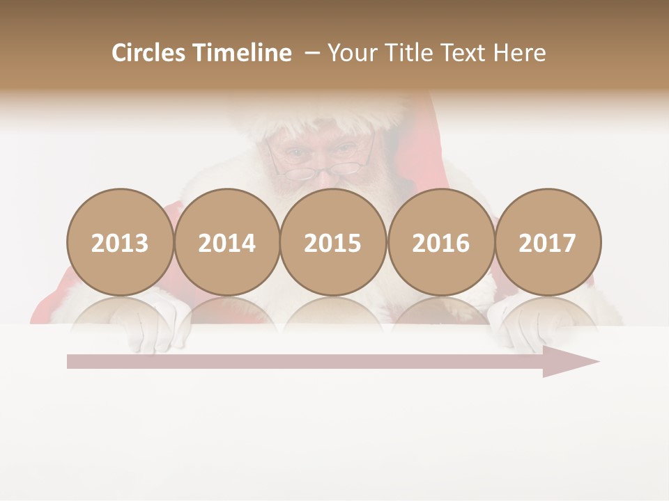 A Man Dressed As Santa Claus Holding A Sign PowerPoint Template