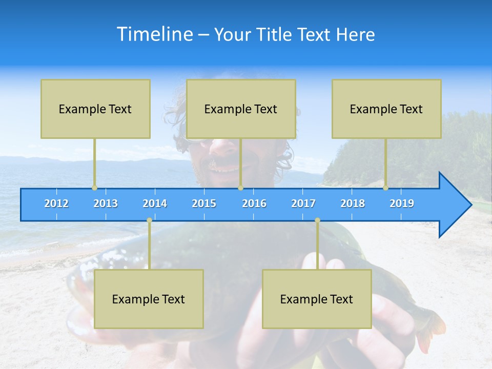 A Man Holding A Large Fish On A Beach PowerPoint Template