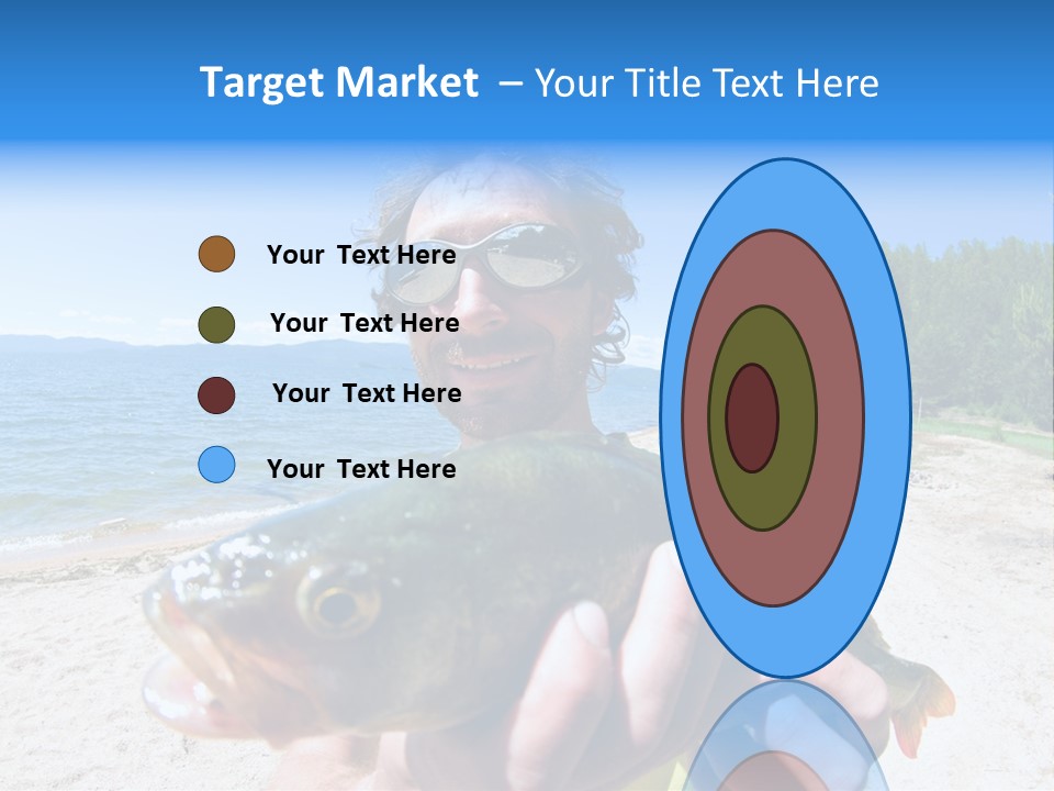 A Man Holding A Large Fish On A Beach PowerPoint Template