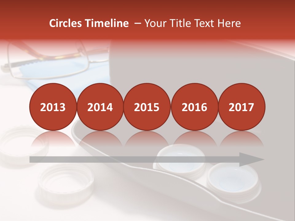 A Pair Of Glasses Sitting Inside Of A Case PowerPoint Template