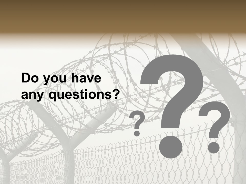 A Barbed Fence With Razors On Top Of It PowerPoint Template