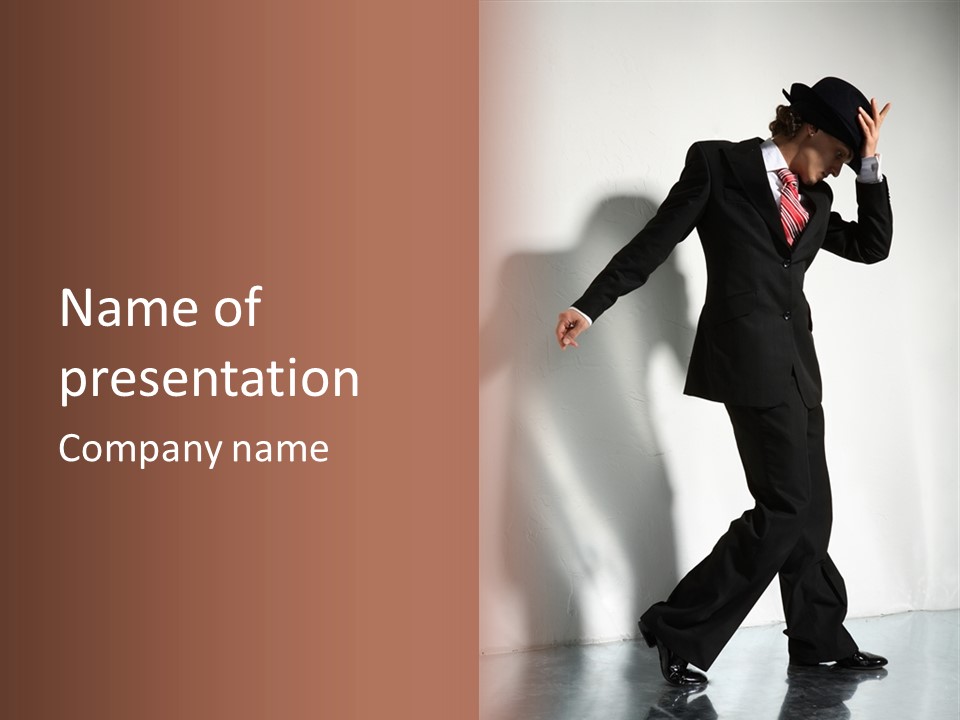 A Man In A Suit And Hat Is Dancing PowerPoint Template