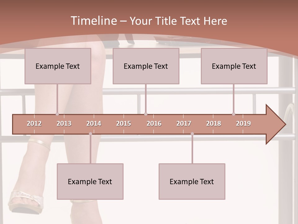 A Woman Sitting On A Desk Using A Laptop Computer PowerPoint Template
