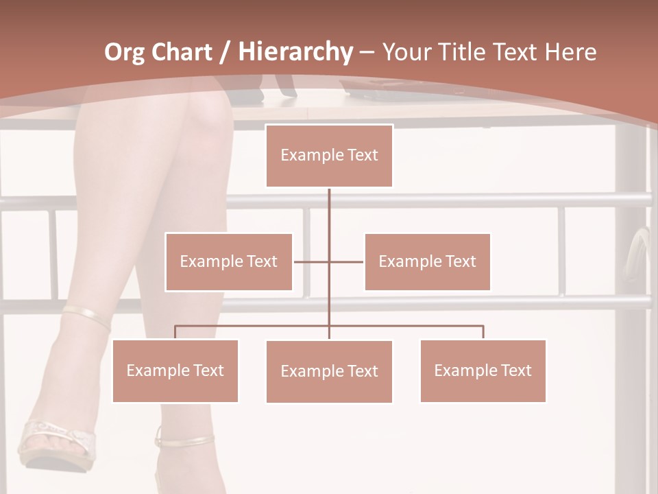 A Woman Sitting On A Desk Using A Laptop Computer PowerPoint Template