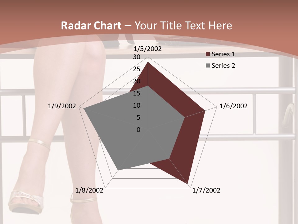 A Woman Sitting On A Desk Using A Laptop Computer PowerPoint Template