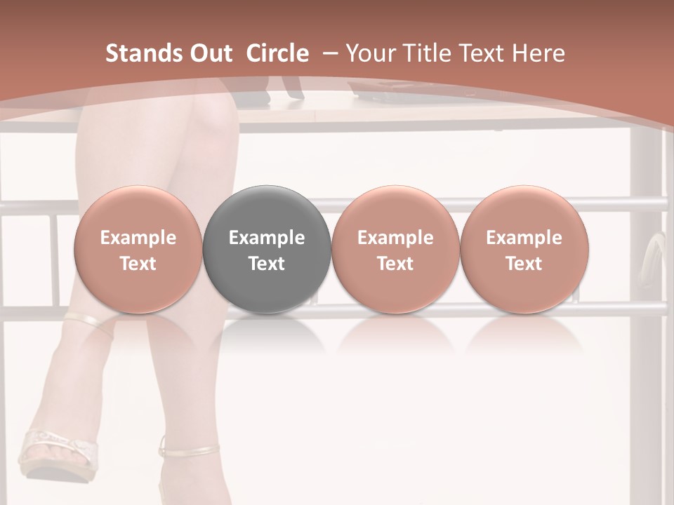 A Woman Sitting On A Desk Using A Laptop Computer PowerPoint Template