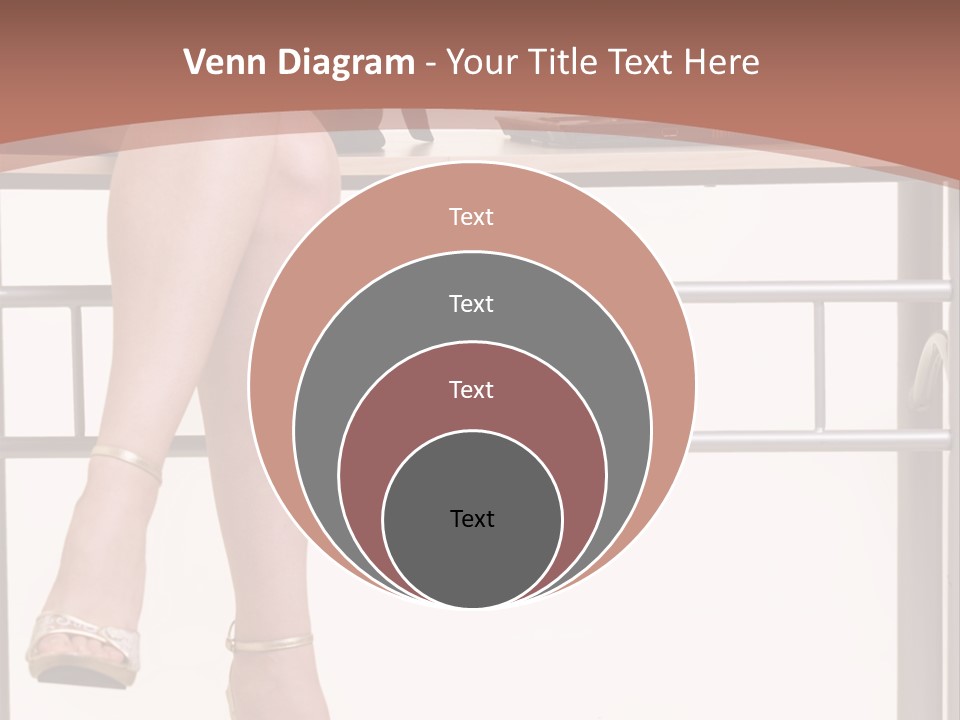 A Woman Sitting On A Desk Using A Laptop Computer PowerPoint Template