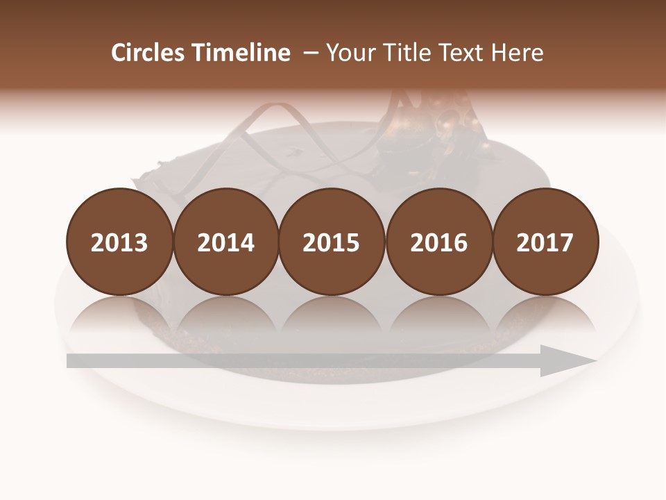 A Chocolate Cake With A Mouse On Top Of It PowerPoint Template