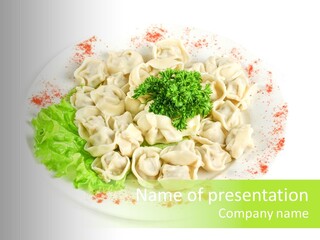 A Plate Of Dumplings And Lettuce On A White Plate PowerPoint Template