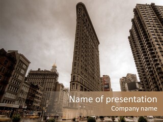 A Picture Of A Very Tall Building In The City PowerPoint Template