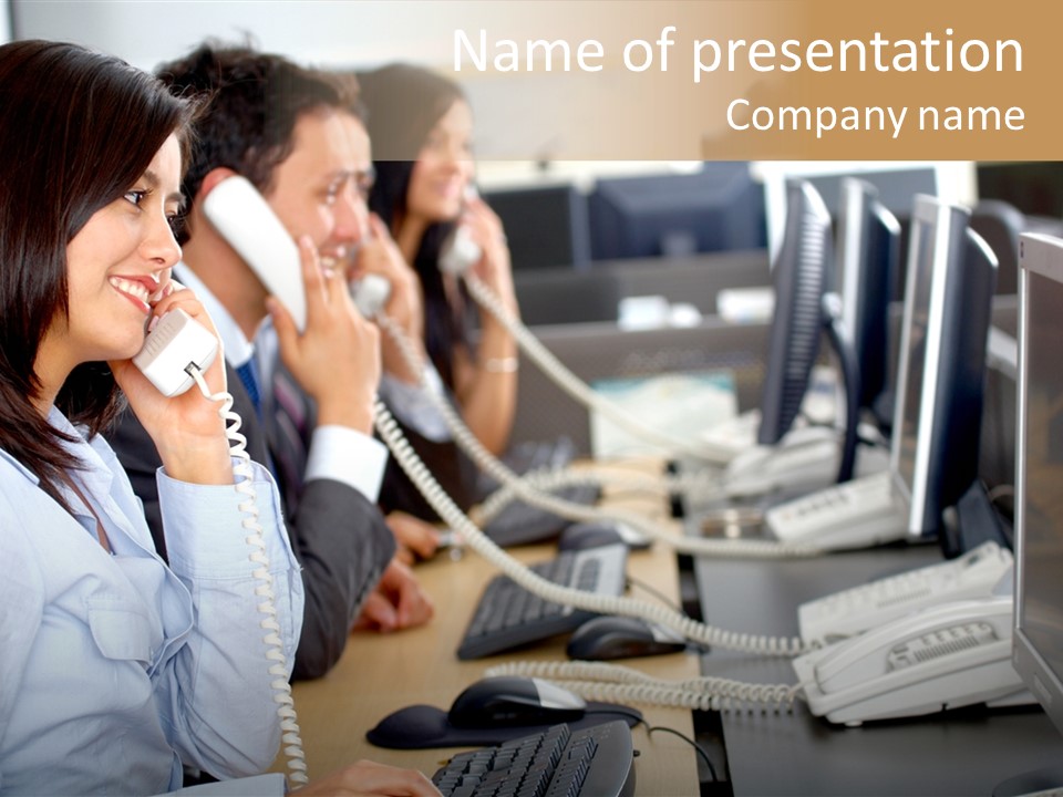 A Group Of People Sitting At A Desk Talking On Telephones PowerPoint Template