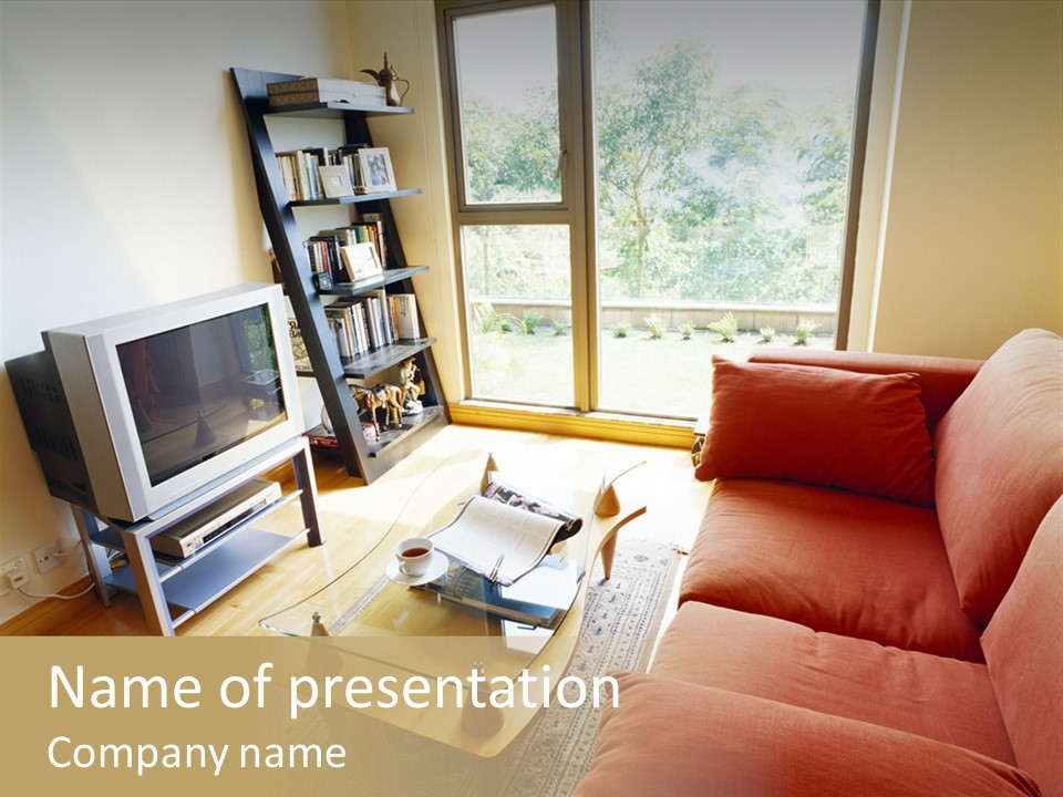 A Living Room Filled With Furniture And A Flat Screen Tv PowerPoint Template