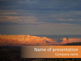 A Large Body Of Water Surrounded By Mountains PowerPoint Template