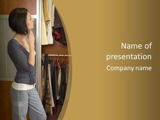 Young Woman Standing At Wardrobe. She Thinking What Get Dressed. PowerPoint Template