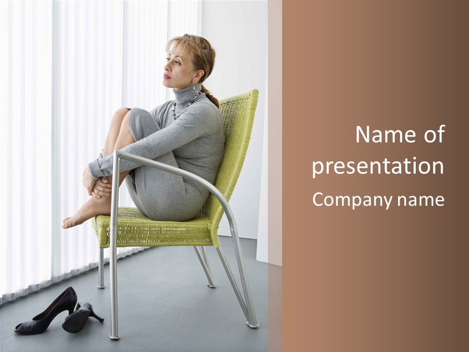 A Woman Sitting In A Chair With Her Legs Crossed PowerPoint Template