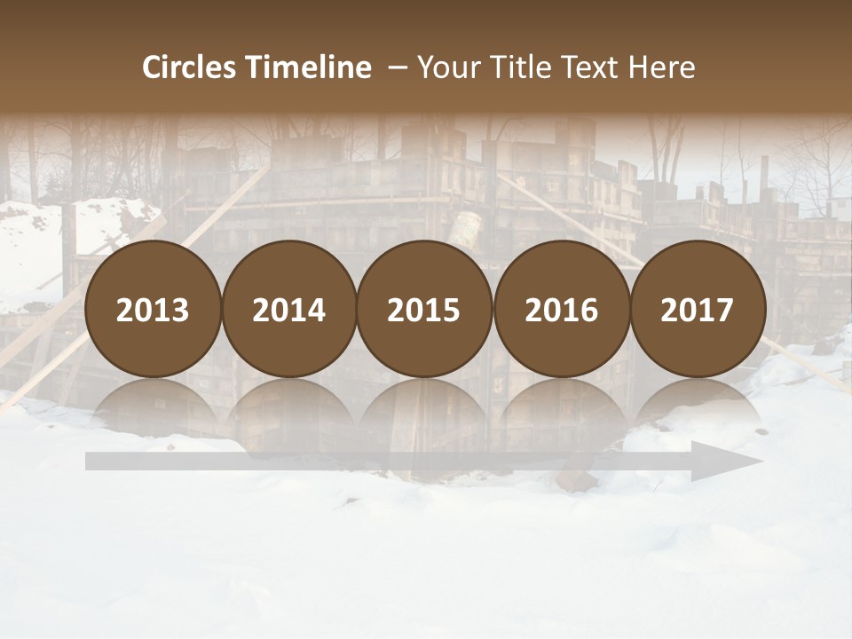 New Home Construction Site In The Winter, With Snow In The Foreground And Woods In The Background PowerPoint Template