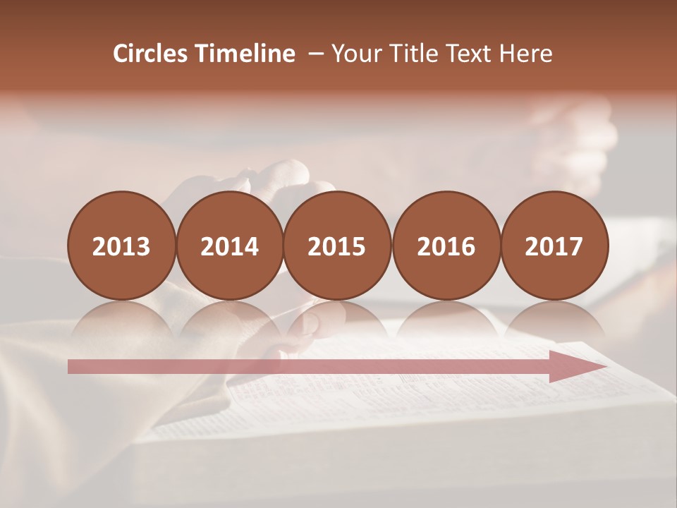 A Couple Prays Together At A Table As Their Hands Rest Upon Their Holy Bibles (Shallow Focus). PowerPoint Template