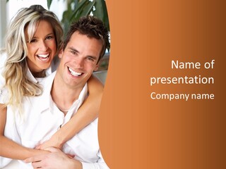 Young Love Couple Smiling In The Comfortable Apartment PowerPoint Template