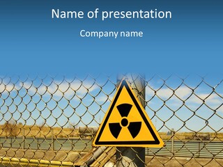 A Yellow Radioactive Hazard Sign On A Chain Link Fence PowerPoint Template