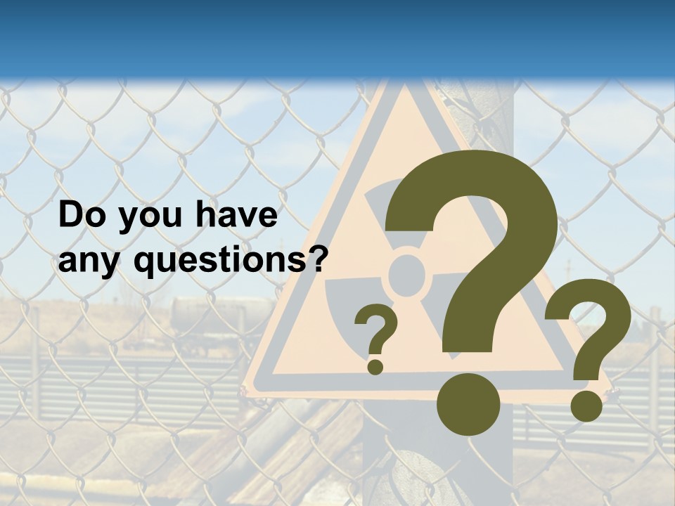 A Yellow Radioactive Hazard Sign On A Chain Link Fence PowerPoint Template