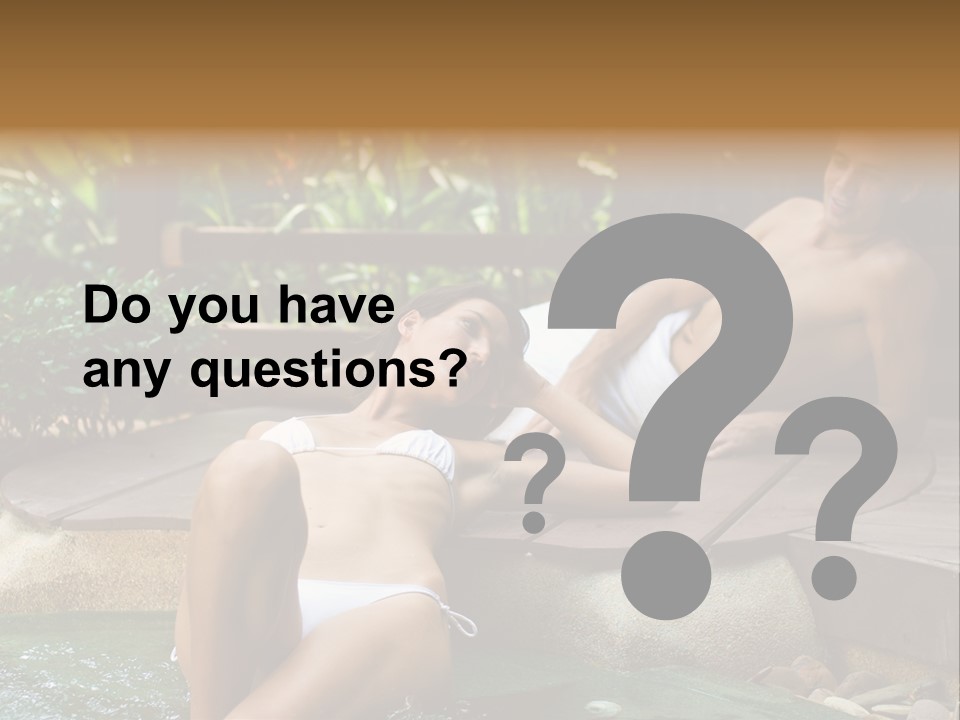A Young Attractive Couple Lying By A Jacuzzi In Tropical Setting PowerPoint Template