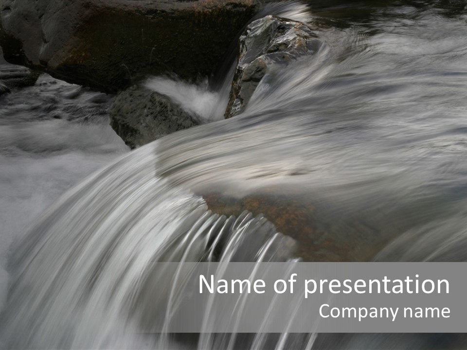 Long Exposure Of A Small Waterfall In Iceland PowerPoint Template