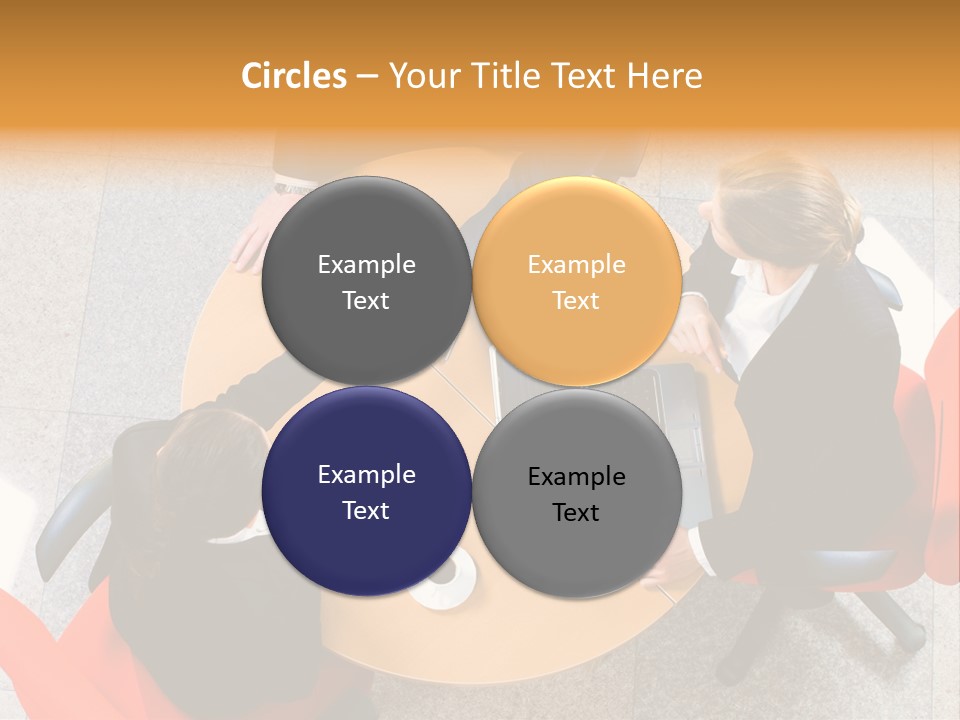 A Group Of People Sitting At A Table With Laptops PowerPoint Template