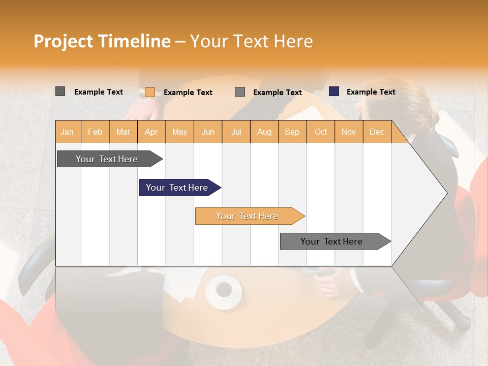 A Group Of People Sitting At A Table With Laptops PowerPoint Template