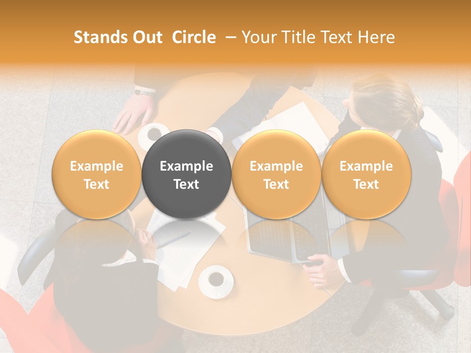 A Group Of People Sitting At A Table With Laptops PowerPoint Template