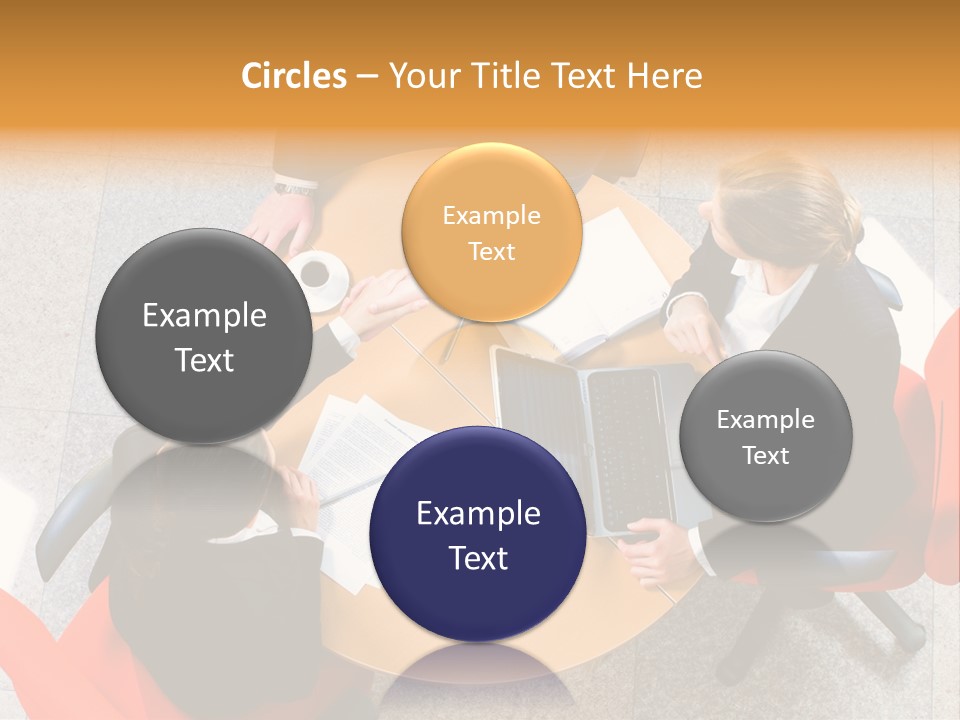 A Group Of People Sitting At A Table With Laptops PowerPoint Template