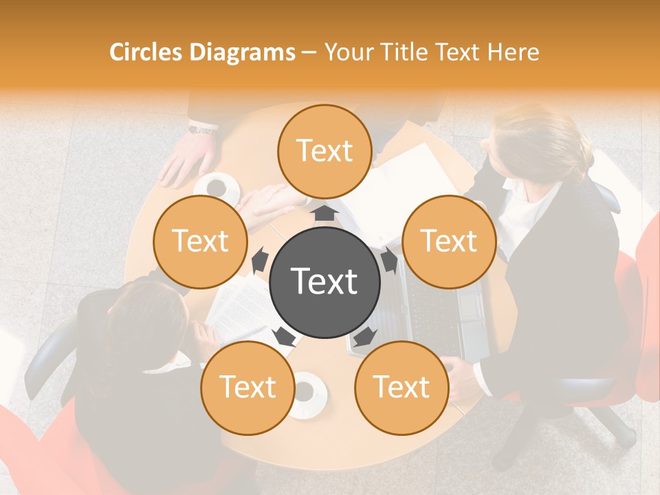 A Group Of People Sitting At A Table With Laptops PowerPoint Template