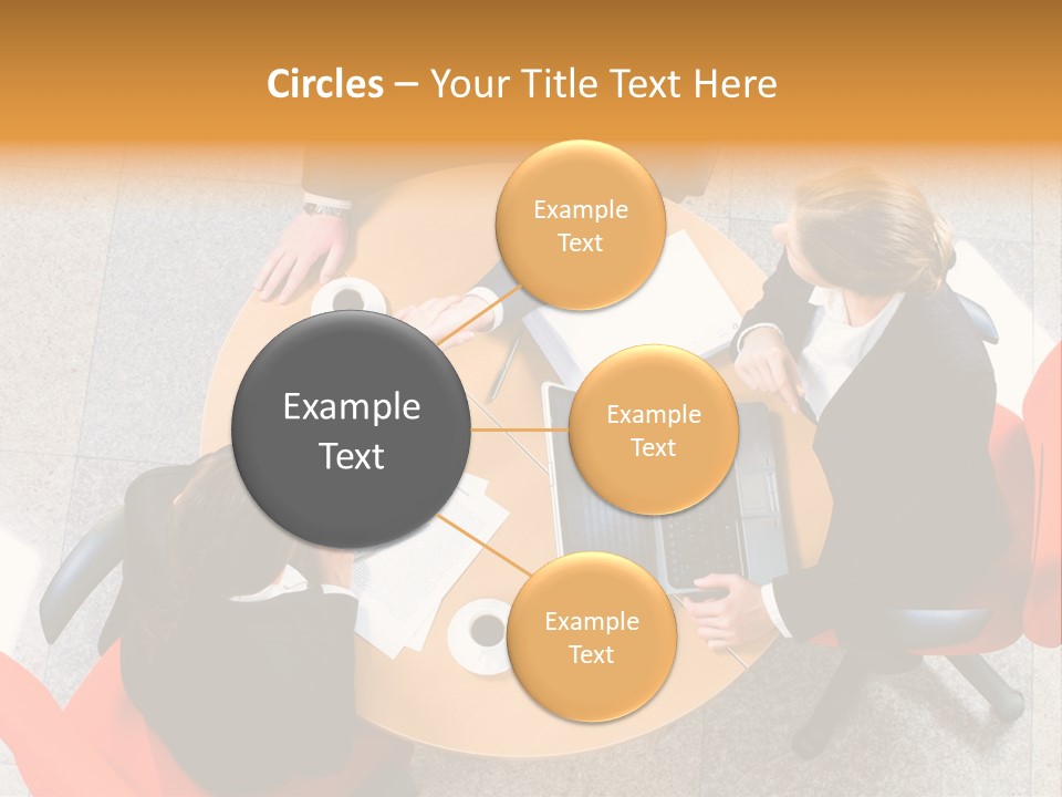 A Group Of People Sitting At A Table With Laptops PowerPoint Template