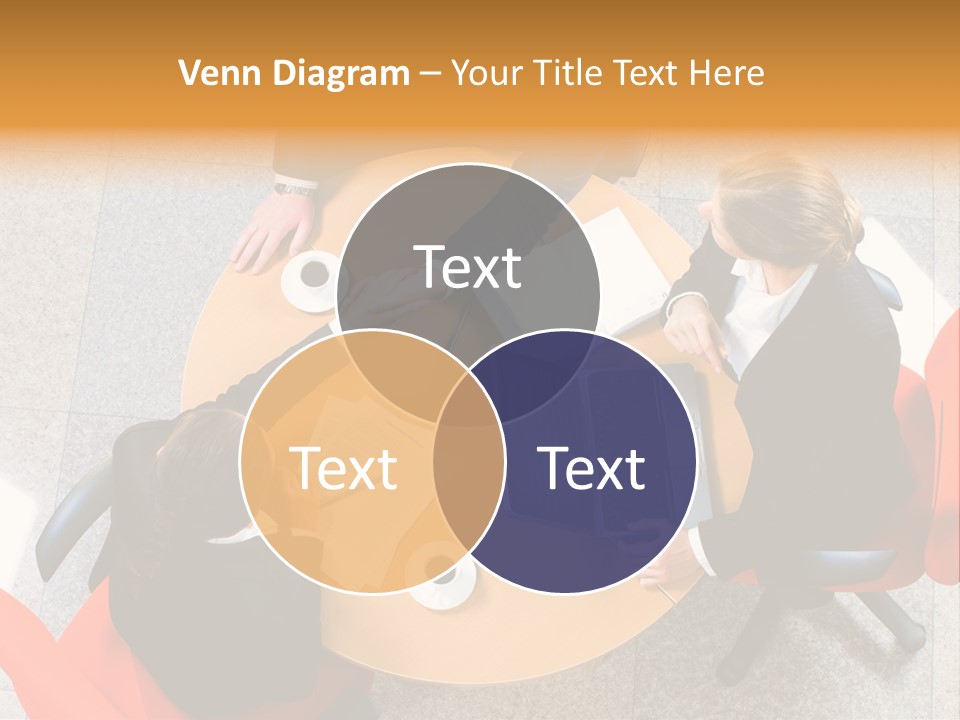 A Group Of People Sitting At A Table With Laptops PowerPoint Template