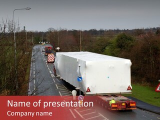 Wide Load Being Escorted On A Main Road In The Uk PowerPoint Template