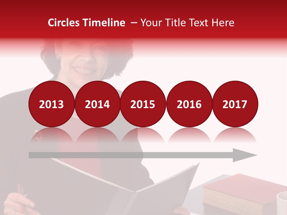 Smiling Business Woman At Desk PowerPoint Template