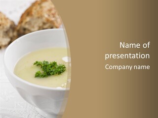 White Bowl Of Asparagus Soup With Chervil And Drops Of Cream. Grainy Bread On Background. Healthy Food. PowerPoint Template