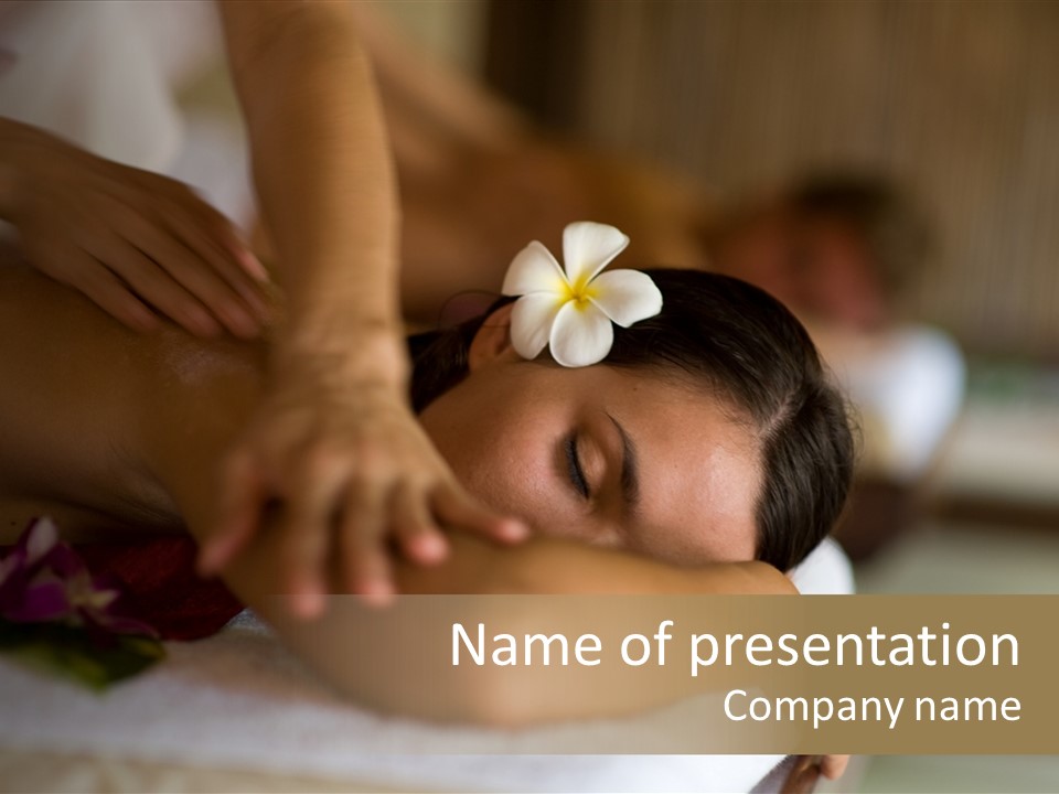 A Young Woman Having Massage In Tropical Spa PowerPoint Template